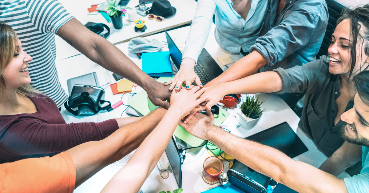 Employees Putting Their Hands Together