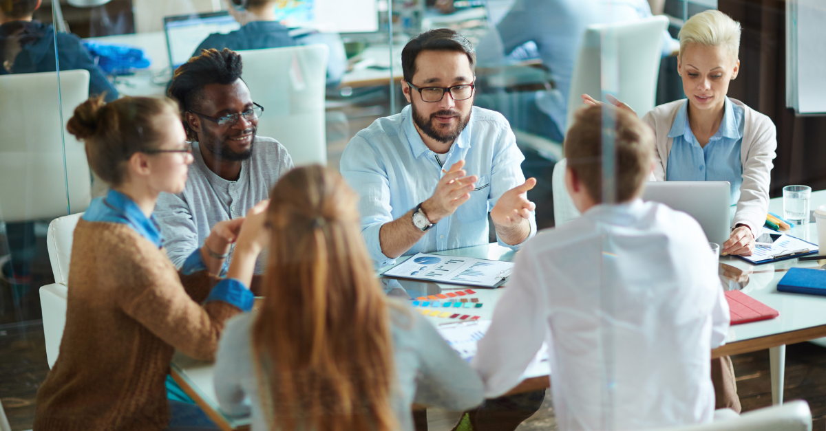 People Discussing at Workplace